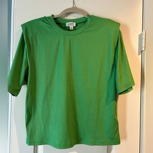 Lime green ribbed short sleeve shirt.